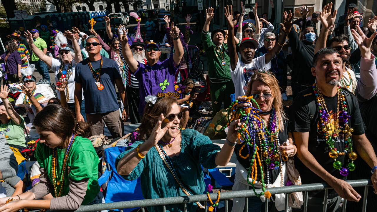 Crowds along the side of the Mardi Gras parade in New Oreans in 2022