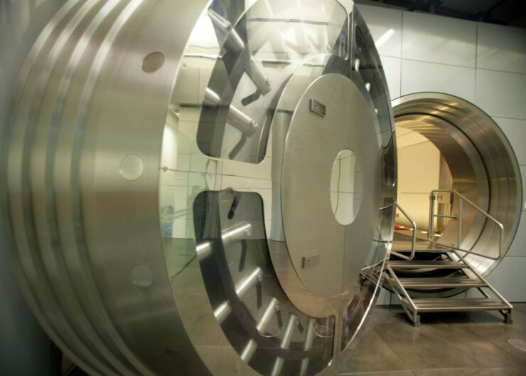 The bank vault is photographed with it's door open in a secu