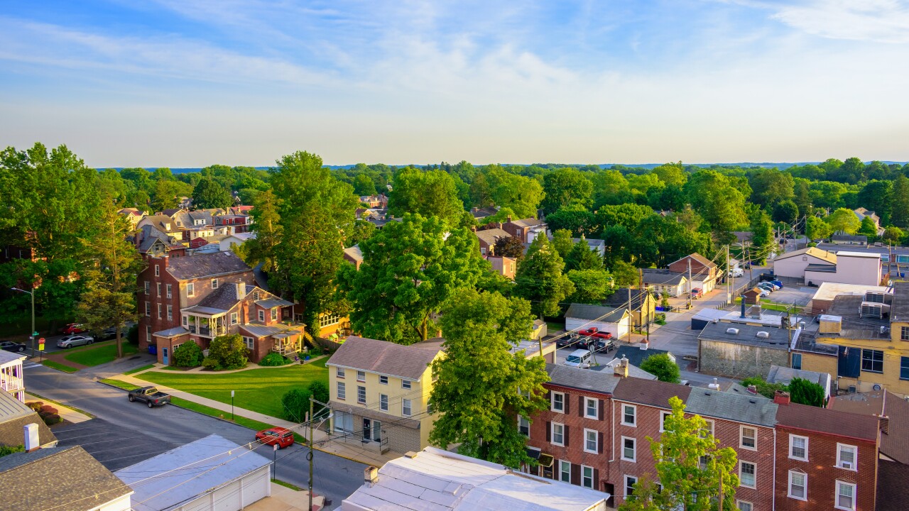 Aerial view of suburban houses and sunset sky - West Chester, Pennsylvania, USA