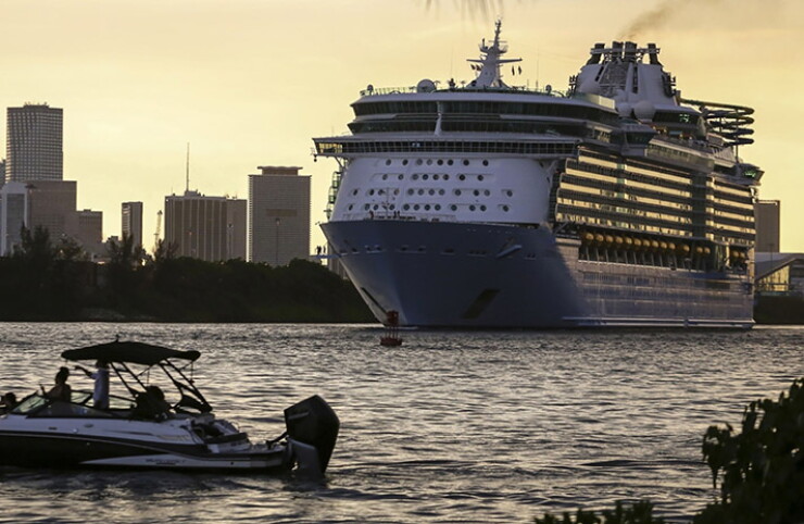 A cruise ship departs for a simulated voyage from PortMiami.