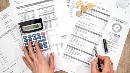 businessman planning monthly home loan, finance concept.
