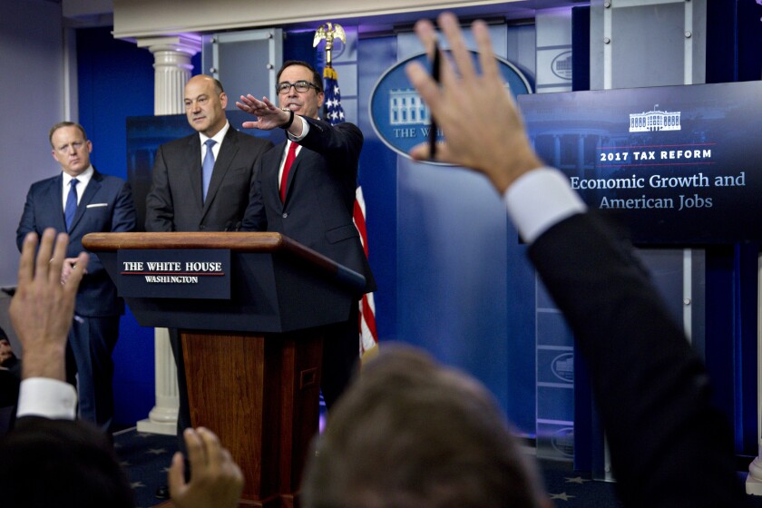 Gary D. Cohn, left, the director of the National Economic Council, and Treasury Secretary Steven Mnuchin last week unveiled the Trump administration’s plan to overhaul the tax code.