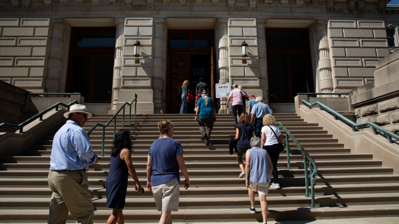 Citizens enter the Indiana Statehouse in Indianapolis
