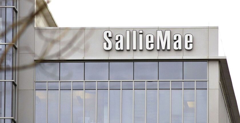A logo hangs outside a Sallie Mae building in Reston, Va.