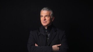 Sergio Ermotti UBS CEO at Davos in black Bloomberg News