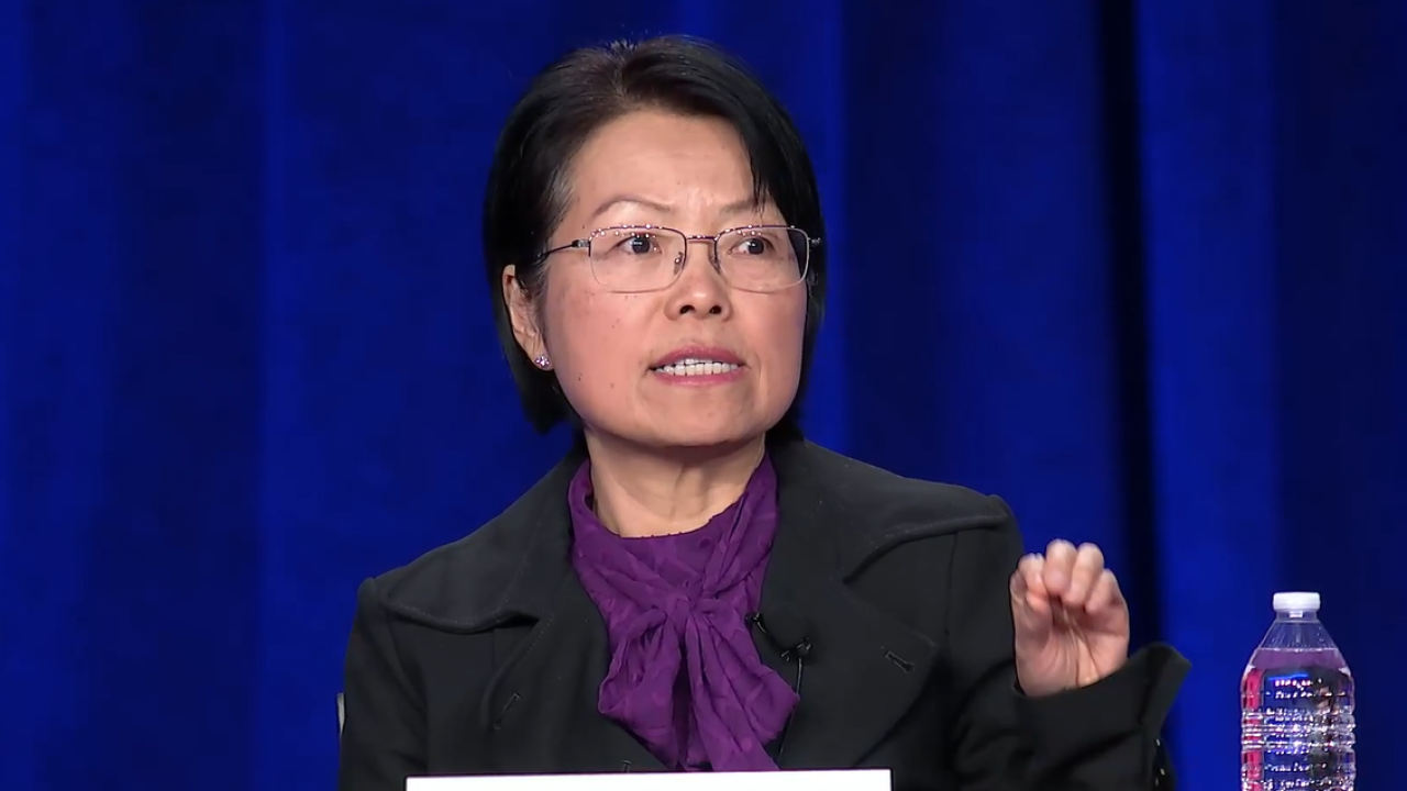 Christina Ho speaking at an AICPA conference when she was a member of the PCAOB