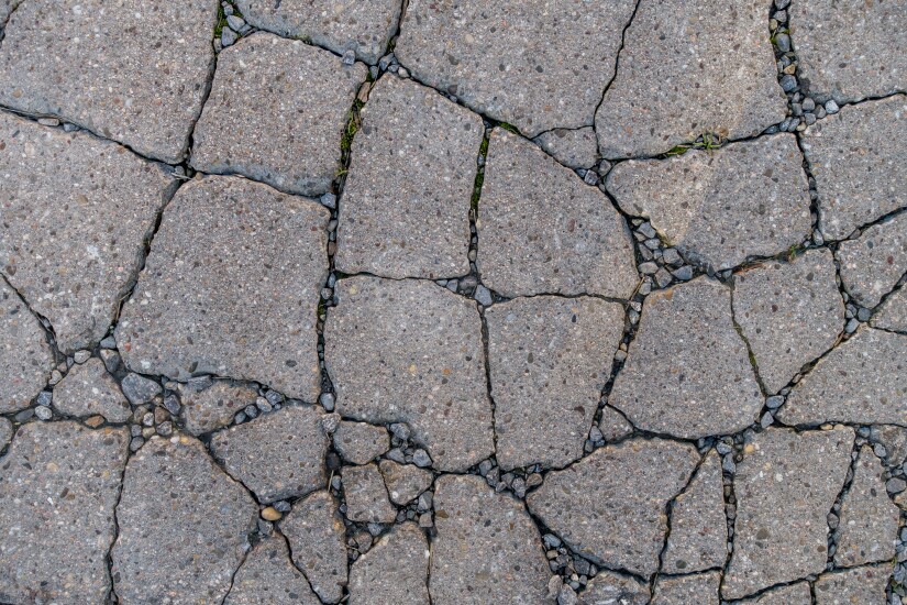 asphalt-cracked-128536820-adobe.jpeg