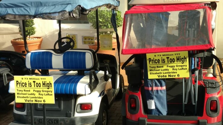 Golf cart signs in Florida’s Solivita retirement community support candidates who say the cost to buy amenities with bonds is too high.