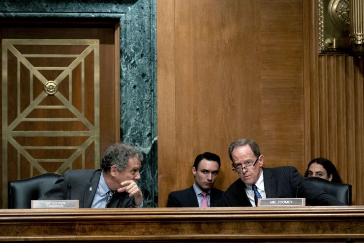 “Homeowners and students who have never heard of Libor will be at risk when it’s discontinued if we don’t take action,” said Sen. Sherrod Brown, D-Ohio, left. Sen. Pat Toomey, R-Pa., said although “it’s appropriate to mandate a SOFR-based index for this relatively small universe of tough legacy contracts, for new contracts banks must have the option to choose among qualified benchmark rates.”