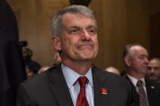 Tim Sloan, chief executive officer and president of Wells Fargo, arrives to testify before a Senate Banking, Housing and Urban Affairs Committee hearing in Washington.