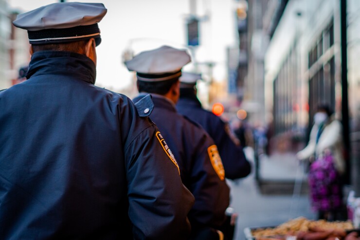 Police officers walking down the street