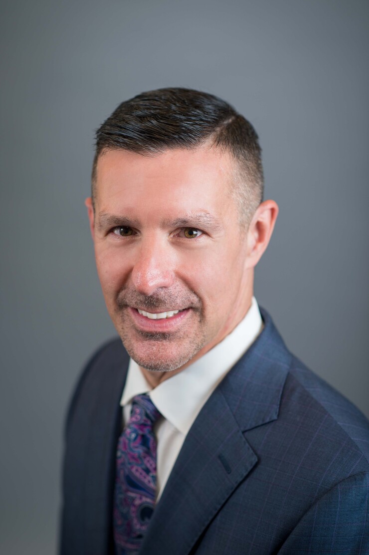 John Holt, Nutmeg State Financial CU