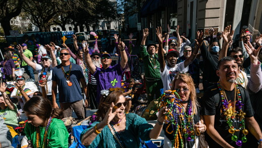 A picture of revelers at Mardi Gras in New Orleans