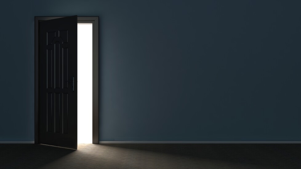 Door in a dark room