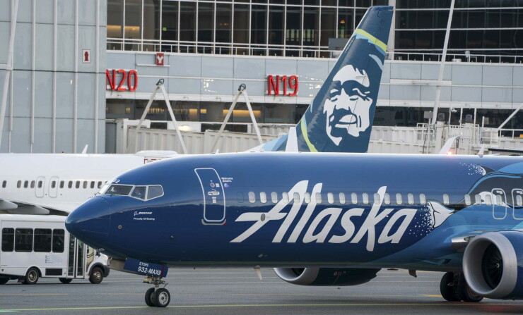 Alaska Air plane taxis at Seattle-Tacoma International Airport.