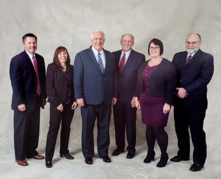 Granite CU’s Executive Team. From left to right: Mark Young, VP Human Resources; Julie Morgan, VP Risk Management; Lynn Kuehne, CEO/President; Jim Davis, SVP/CLO; Mary Woodard, COO; and Paul Metcalf, CFO.