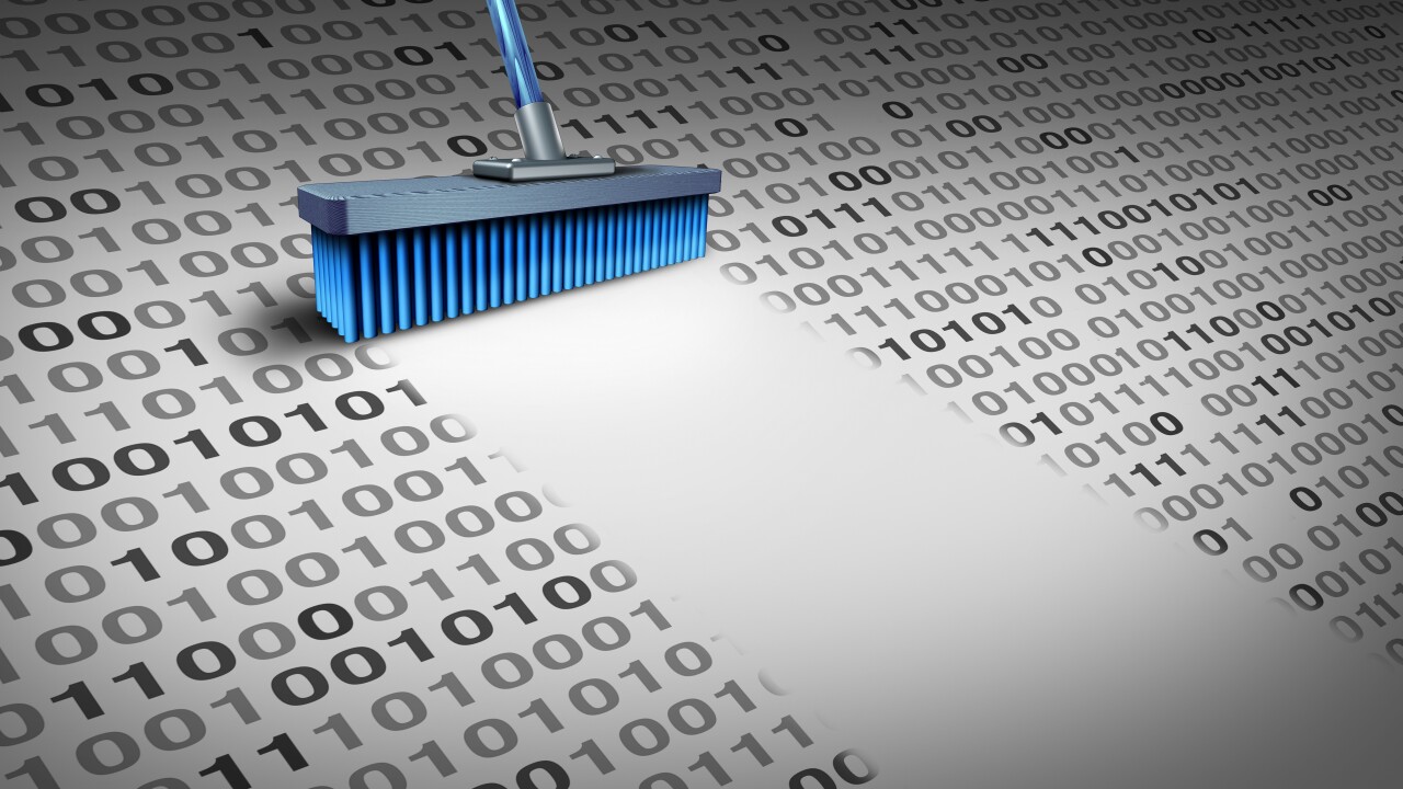 Broom brushing away 0 and 1 data bits.