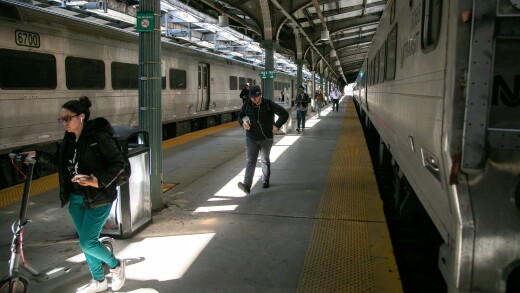 New Jersey transit trains and passengers in a station