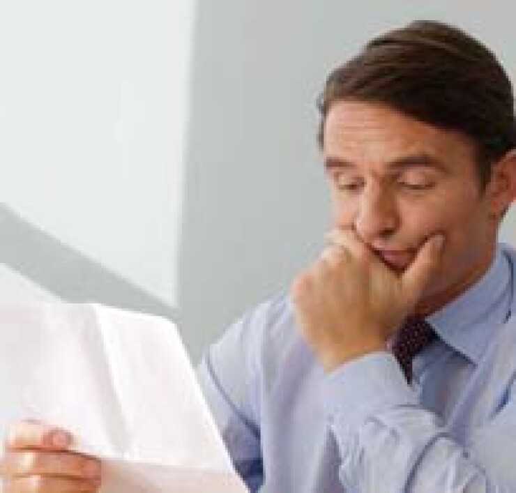 man-reading-letter-crop-ts.jpg