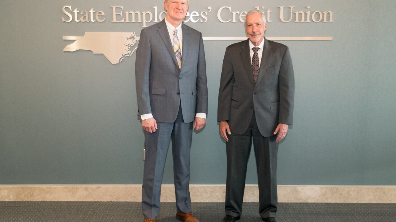 SECU CEO Mike Lord and CCUL President and CEO John Radebaugh