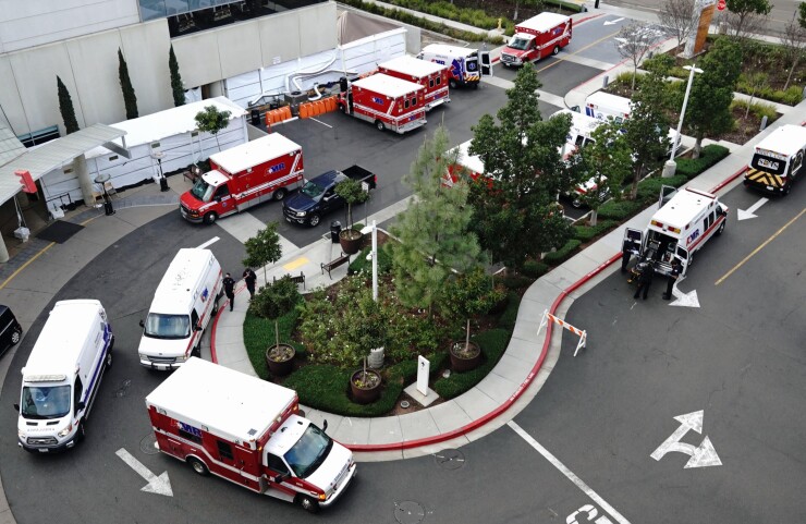 Ambulances outside the emergency department of Sharp Memorial Hospital in San Diego, California, on Thursday, Jan. 28, 2021.