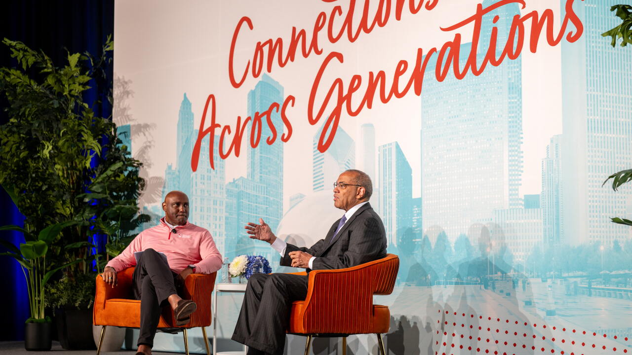 George Nichols of The American College of Financial Services (left) interviewed John Rogers of Ariel Investments (right) in a keynote session at this week's CAAFP in Chicago.