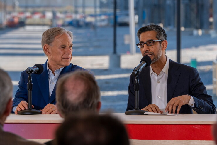 Texas Gov. Greg Abbott and Alphabet CEO Sundar Pichai in Midlothian, Texas, on Nov. 14