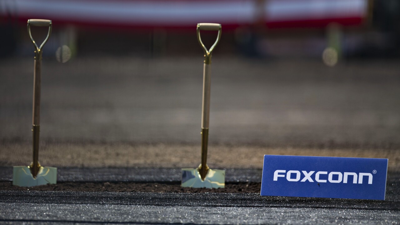 Shovels stand in a patch of dirt ahead of the groundbreaking ceremony for the Foxconn Technology Group facility in Mount Pleasant, Wisconsin, U.S., on Thursday, June 28, 2018