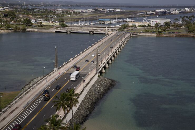 Traffic moves along the Condado Bridge in San Juan, Puerto Rico.