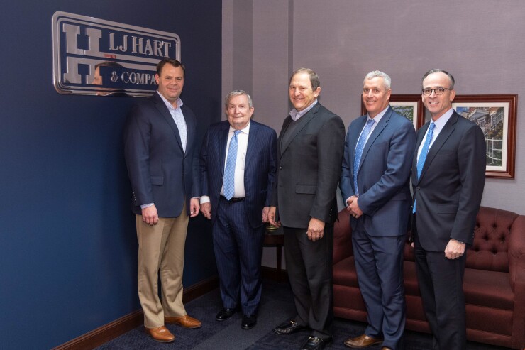 From left, Thomas J. Pisarkiewicz, president, LJ Hart; Larry J. Hart, chairman, chief executive officer and founder, L.J. Hart; Chuck Kim, executive vice president and chief financial officer, Commerce Bancshares, Inc.; Matt Burkemper, director of finance and corporate development, Commerce Bank; Bob Holmes, chairman and chief executive officer, Commerce Bank - St. Louis.