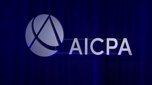 AICPA logo on curtain at AICPA conference