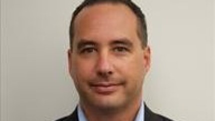 Headshot of George Tziahanas.