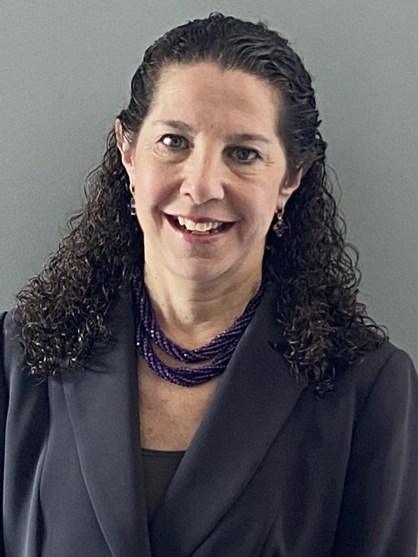 Headshot of Carol Laufer.