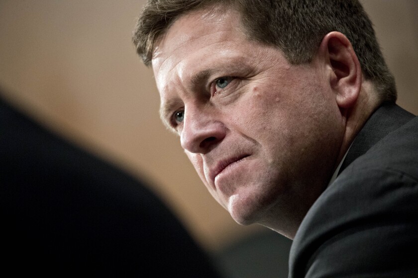 Jay Clayton, chairman of the U.S. Securities and Exchange Commission (SEC), listens during a Senate Banking, Housing and Urban Development Committee hearing in Washington, D.C., U.S., on Tuesday, Feb. 6, 2018