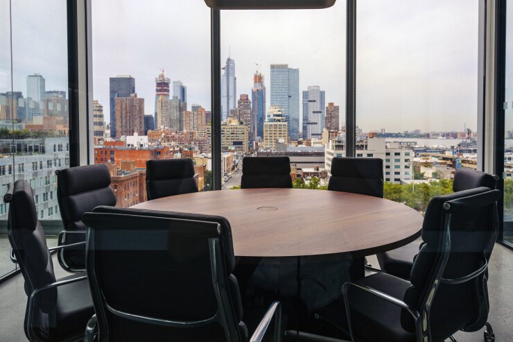 Buildings in the Manhattan skyline are seen from a meeting at the Dwight Capital LLC new office space inside 787 11th Avenue in New York
