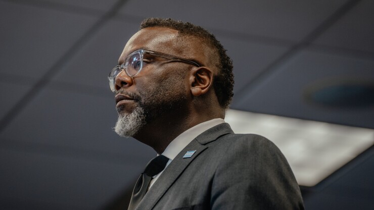 Chicago Mayor Brandon Johnson speaks at lectern