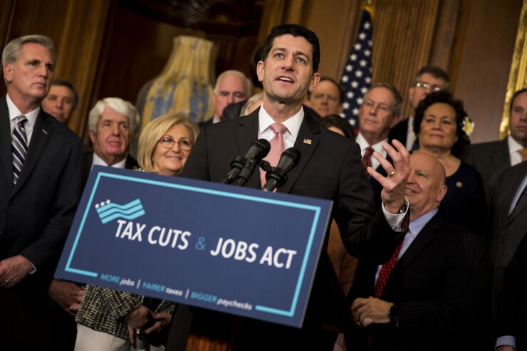 Speaker of the House Paul Ryan, a Republican from Wisconsin, speaks during a Tax Cuts and Jobs Act enrollment ceremony at the U.S. Capitol in Washington, D.C.