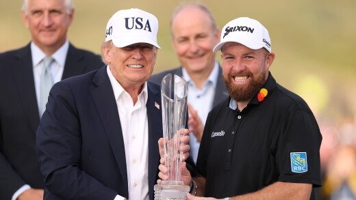 President Donald Trump, left, and Shane Lowry of Ireland pose with the trophy at the Irish Open in Doonbeg.