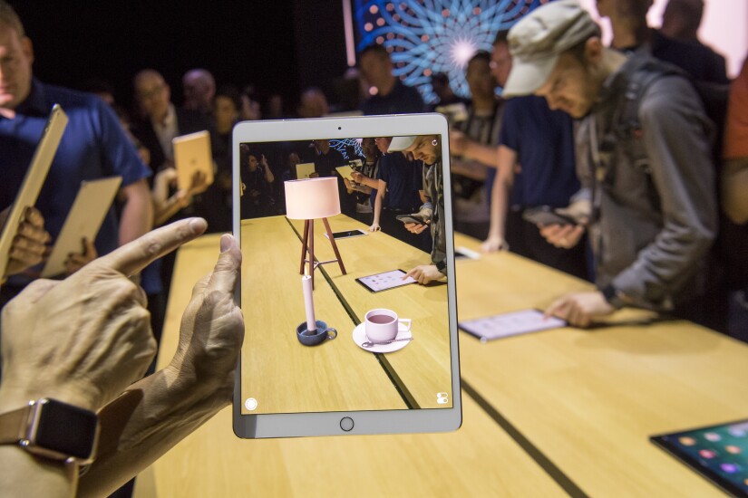 Apple's ARKit creates a lamp and coffee cup