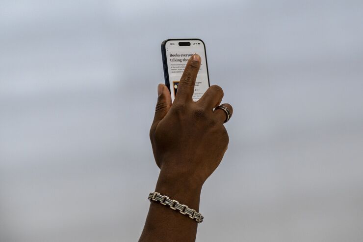 An attendee holds an Apple iPhone 15 Pro during an event at Apple Park campus in Cupertino, California, US, on Tuesday, Sept. 12, 2023. Apple Inc. introduced its latest iPhones at an event Tuesday, banking on new materials, camera upgrades and improved performance to coax back consumers in a sluggish smartphone market. Photographer: David Paul Morris/Bloomberg