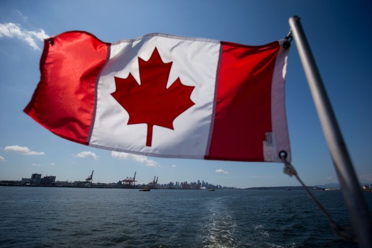 A Canadian flag flies from a Harbour Authority patrol boat