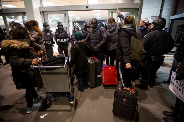 immigrant-bank-jfk-bl012817