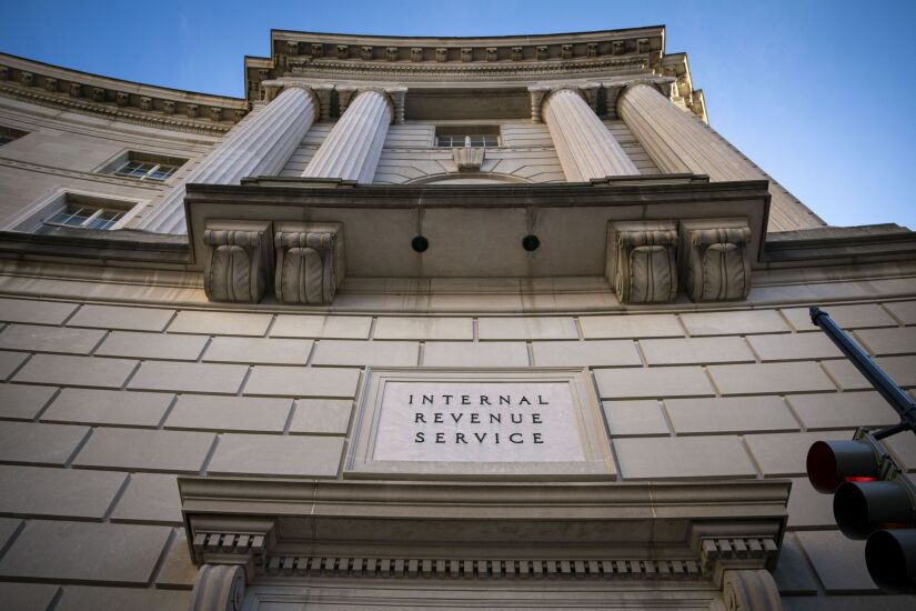 closeup of IRS headquarters, focusing on "Internal Revenue Service" sign over doorway
