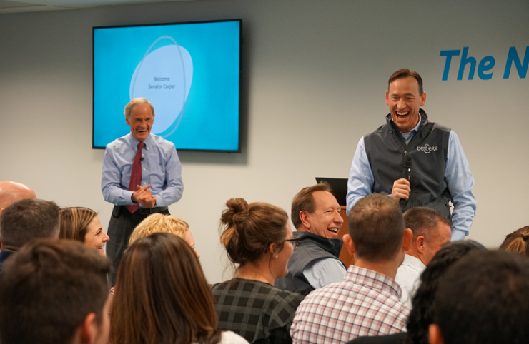Marlette Funding CEO Jeffrey Meiler laughs as he welcomes Delaware Sen. Tom Carper to Best Egg employees.
