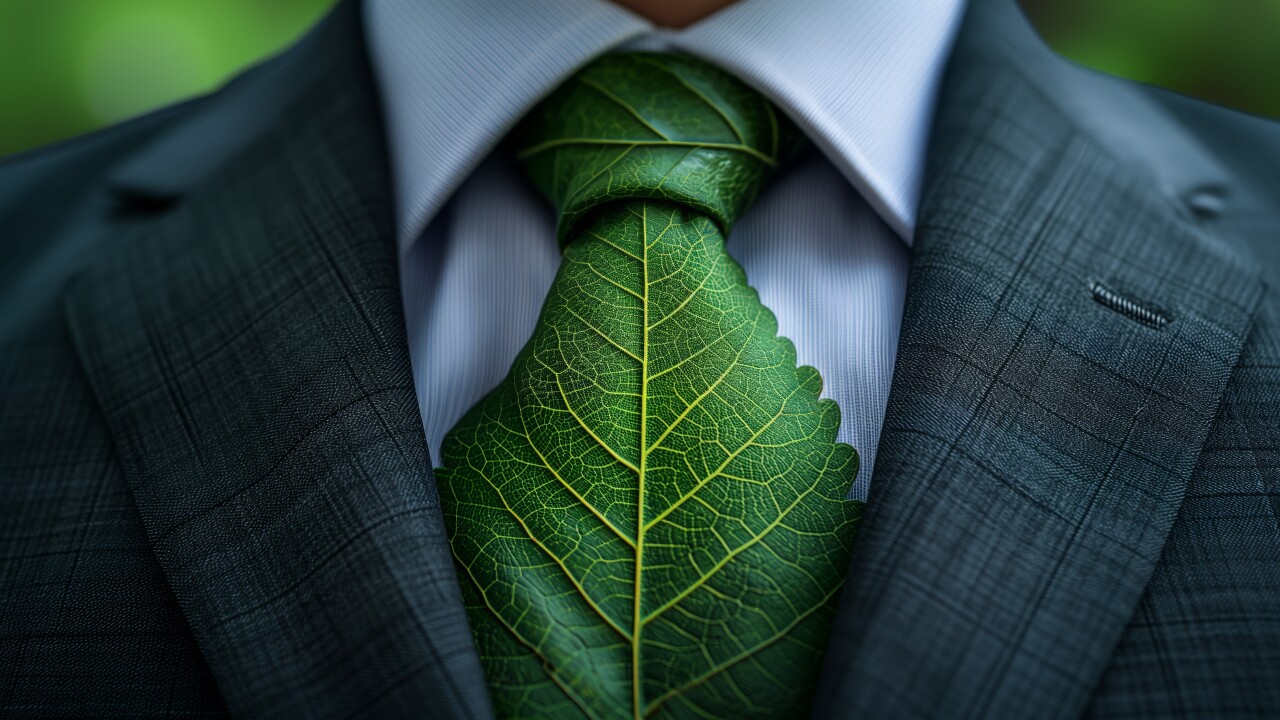 Businessman in a suit wears a tie made of green leaves, symbolizing environmental consciousness. promotes sustainability Ideal for eco-conscious and sustainable business themes
