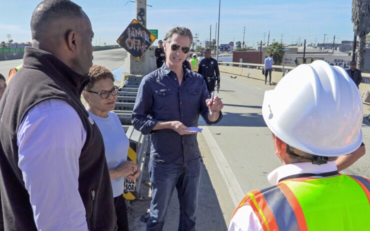 California Transportation Secretary Toks Omishakin, Los Angeles Mayor Karen Bass, and Gov. Gavin Newsom at scene of fire that closed Interstate 10.