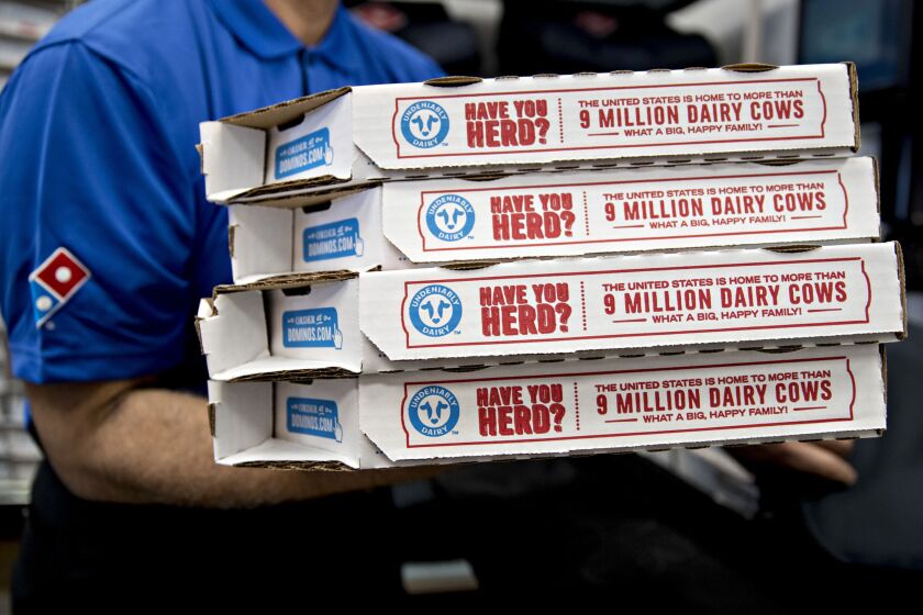 As Coronavirus Makes Pizza Deliveries Soar Domino S Speeds Driver
