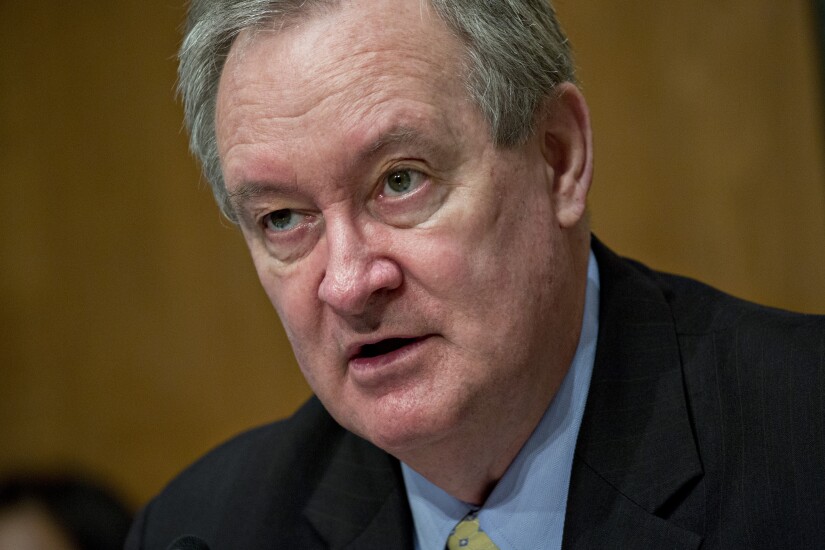 Senator Mike Crapo, a Republican from Idaho and chairman of the Senate Banking Committee, makes an opening statement during a hearing in Washington on the Equifax cybersecurity breach.