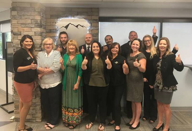 Staff at Rocky Mountain Law Enforcement Federal Credit Union. Front row, from left: Ashly Torres (branch manager), Judy Yodonise (branch manager), Beckie Gibson (business development manager), Lauren Lawrence (branch supervisor), Melinda Mayotte (CFO), Jessica Smedes (COO) and Christine Wiley (president and CEO). Back row: Derek Horton (systems and applications engineer), Angel Diaz (branch manager), Cary Karcher (VP of branch performance) and Jill Lopez (branch manager).