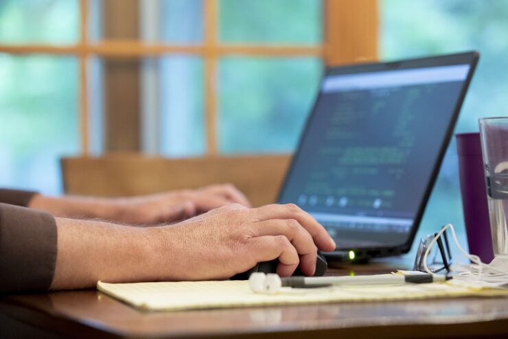 remote-work-laptop-bloomberg-022321